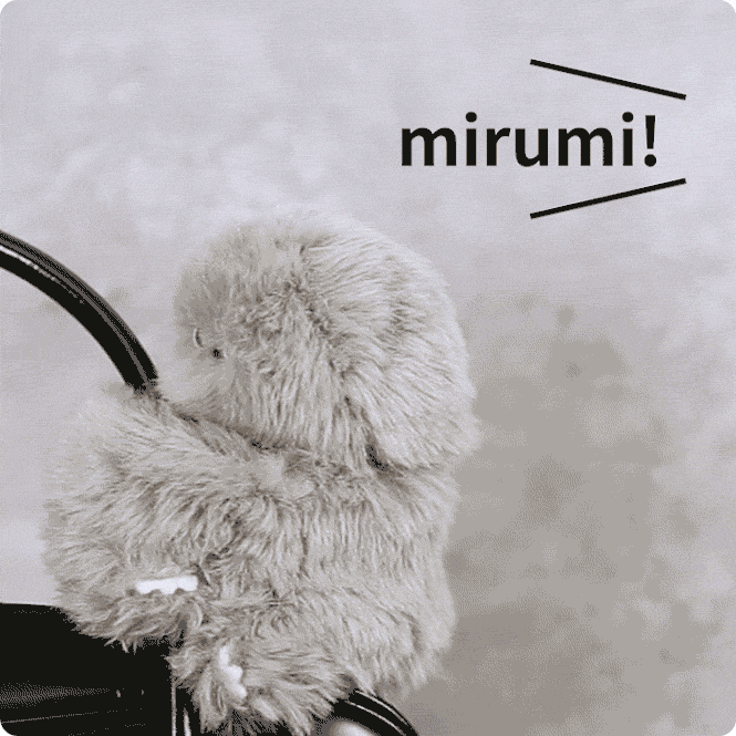 Official animation of Mirumi holding a bag strap and turning its head from behind and to one side to face forward